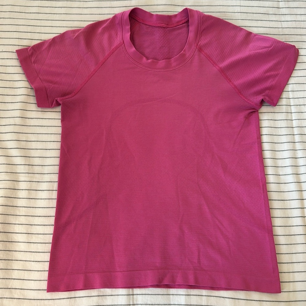 Lululemon swiftly tech, bright pink, hip length, size 4